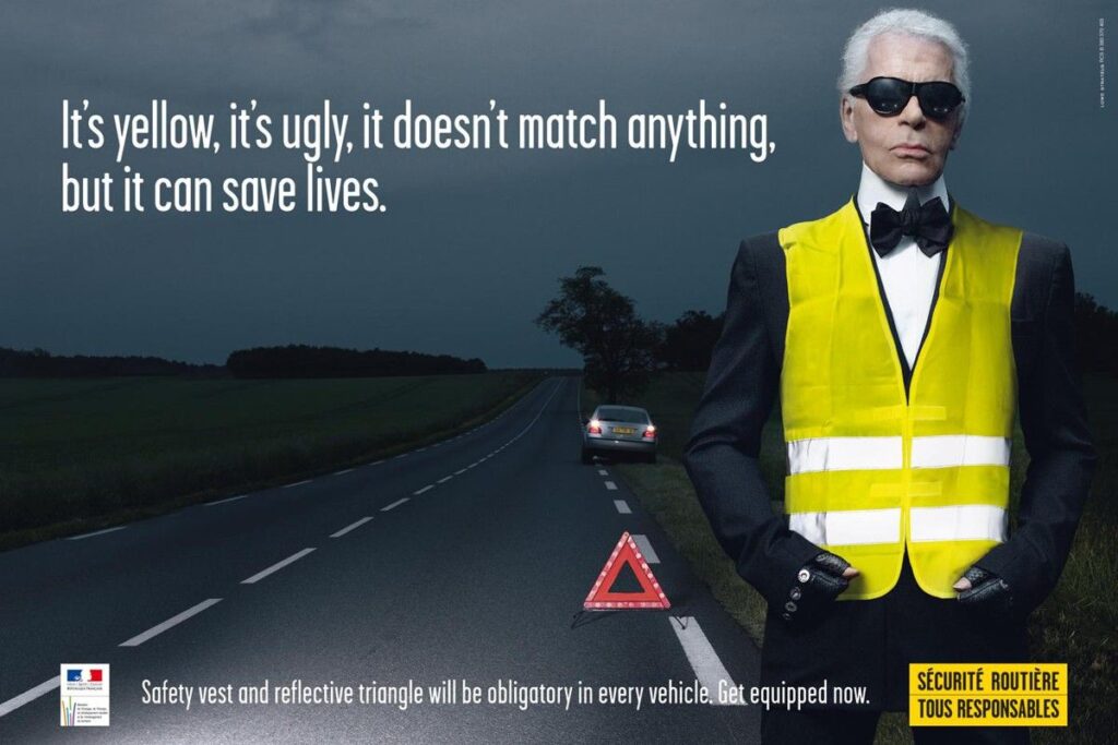Karl Lagerfeld w reklamie kamizelek odblaskowych
